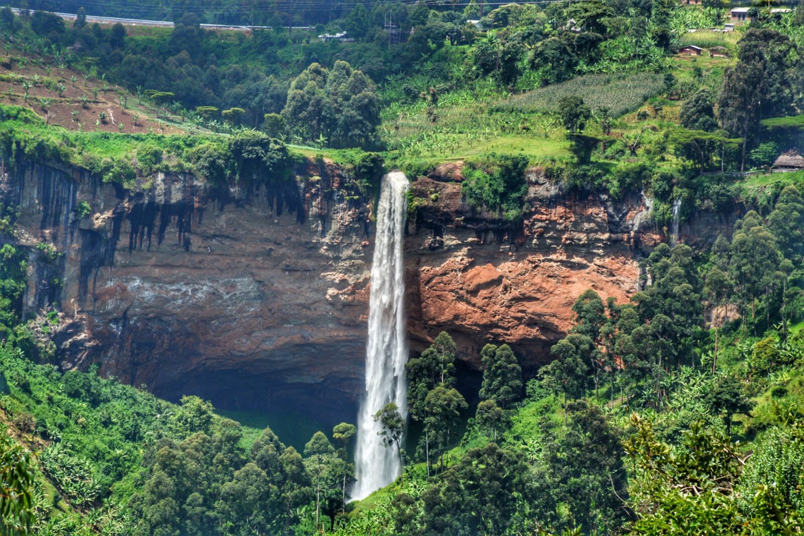 Hiking Sipi Falls in Uganda.
