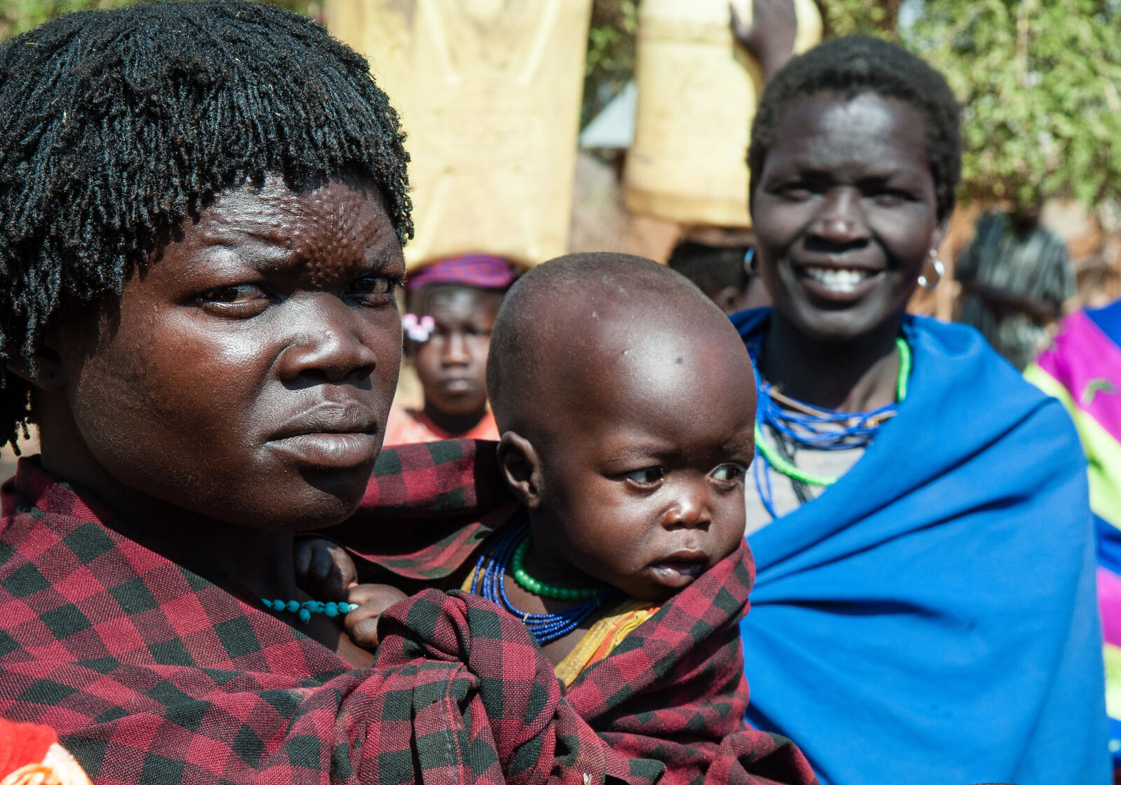 Which languages do Ugandans speak